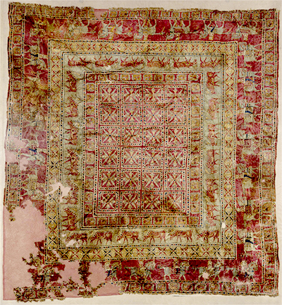 Pazyryk Rug: the oldest pile rug still in existence. Photo taken from the Hermitage Museum image collection.